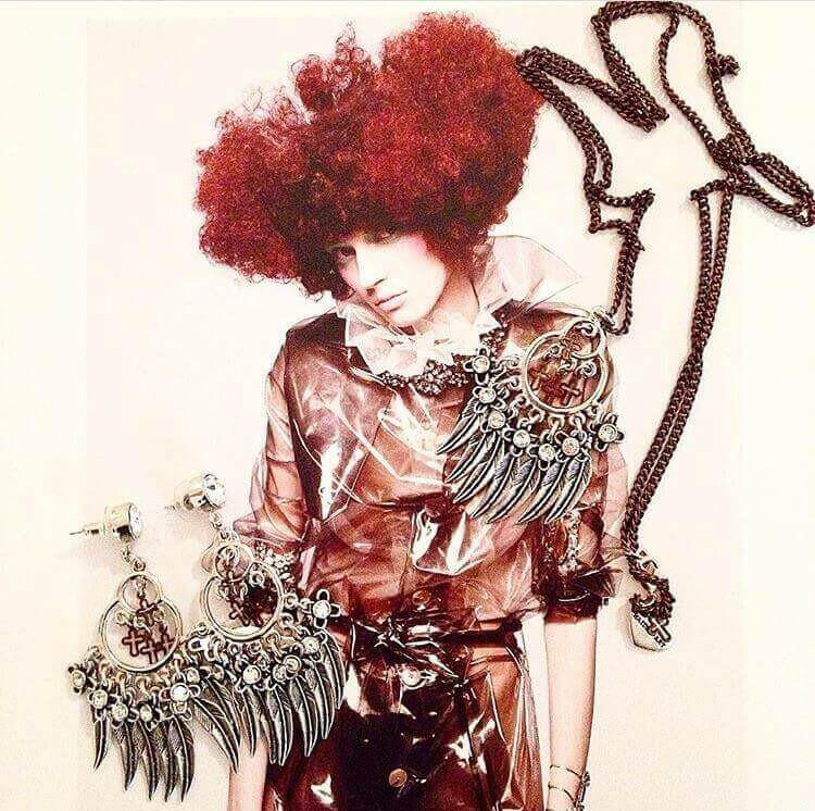 Chandelier earrings with feathers, crosses, Swarovski crystals and