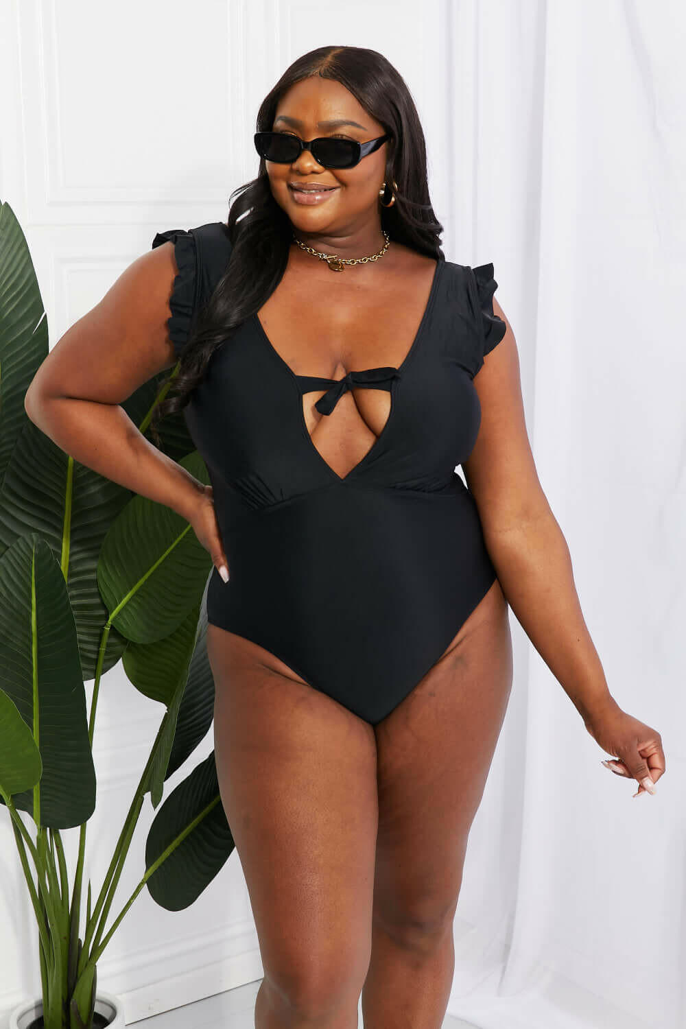 Marina West Swim Seashell Ruffle Sleeve One-Piece in Black.