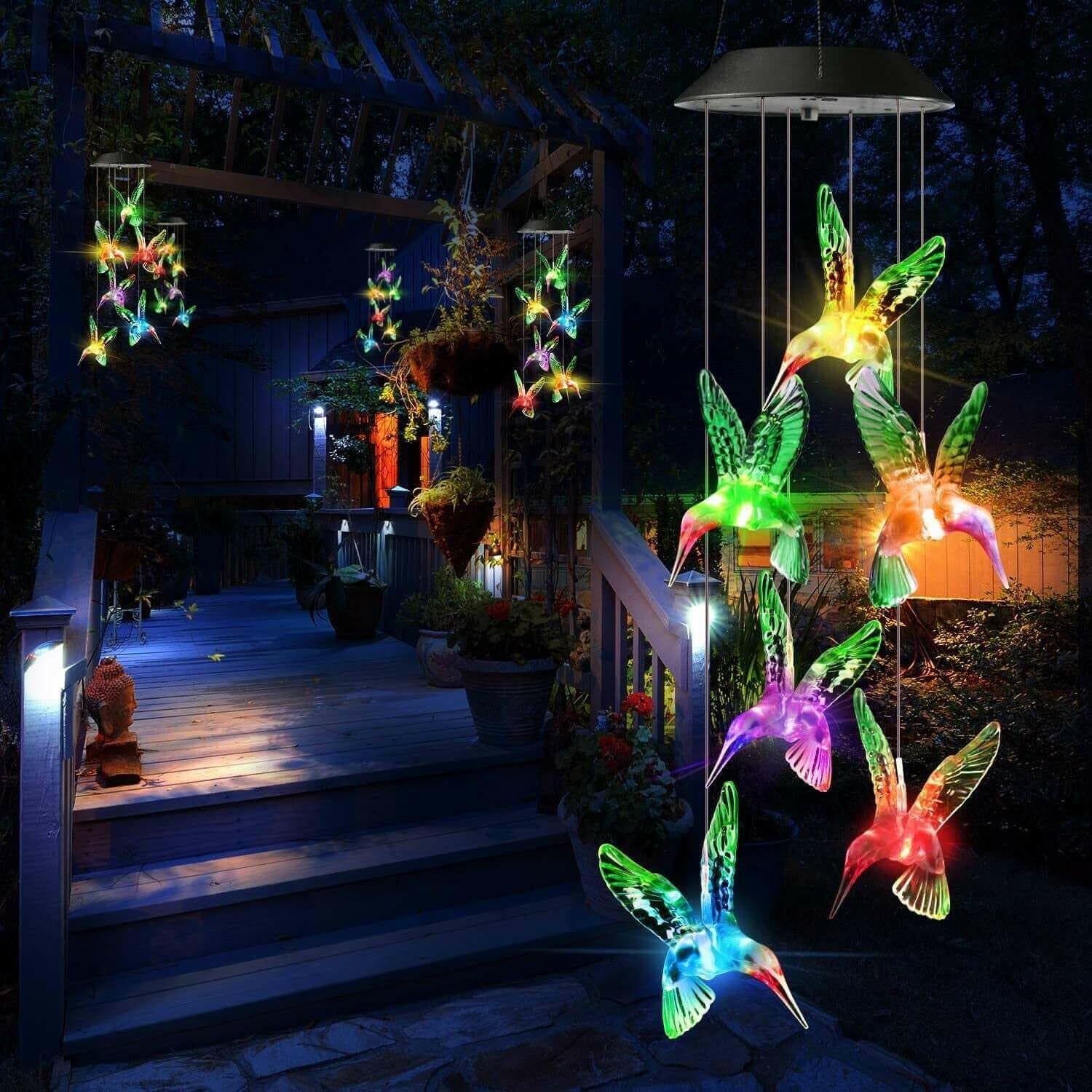 Outdoor solar wind chime light Hummingbird wind chime garden light.