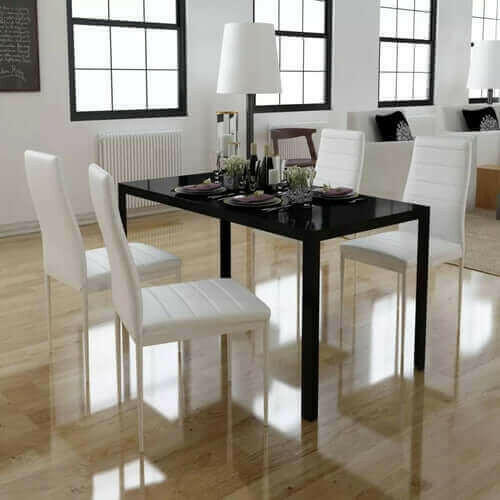 Seven Piece Dining Table and Chair Set Black and White.