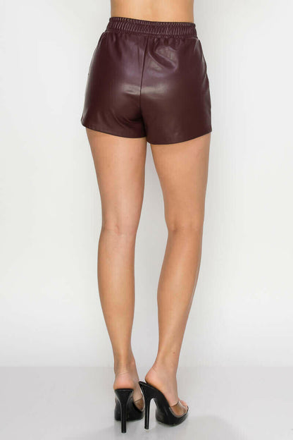 Pocketed High-rise Faux Leather Shorts.