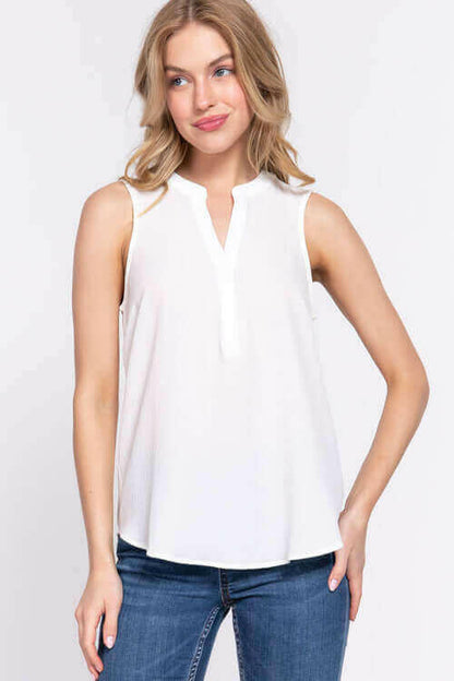 Sleeveless Henley Neck Woven Top.