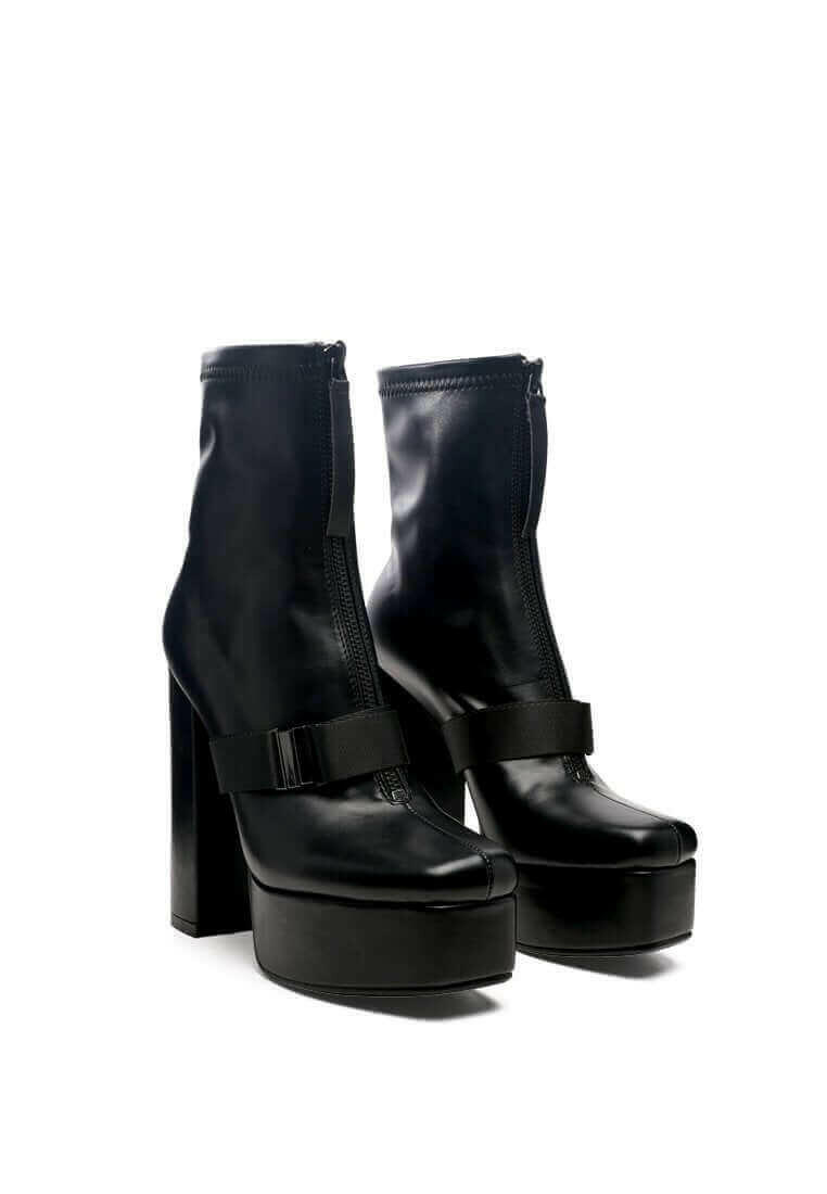 boomer chunky high block heel boots.