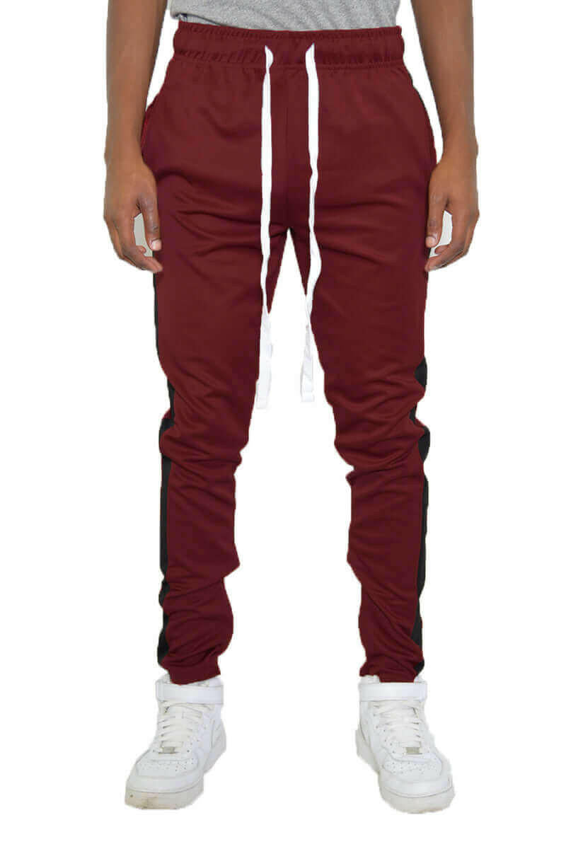 SLIM FIT TRACK PANTS.