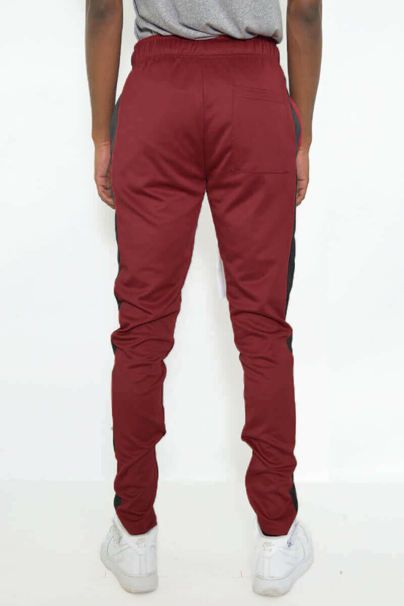 SLIM FIT TRACK PANTS.