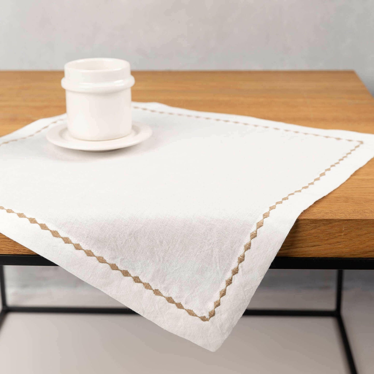 Embroidered hemp placemat, white.