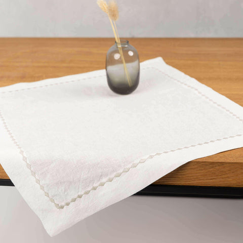 Embroidered hemp placemat, white.