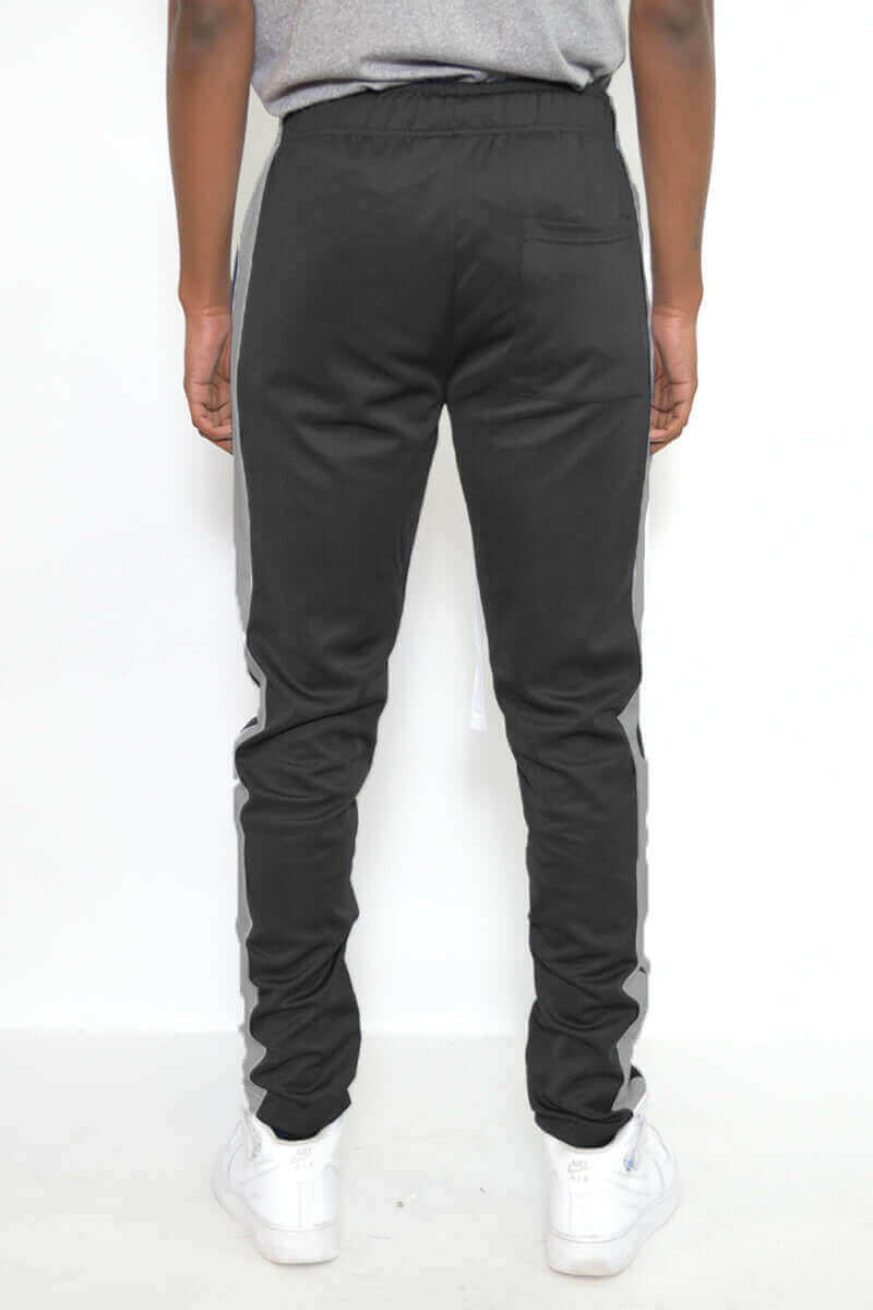 SLIM FIT TRACK PANTS.