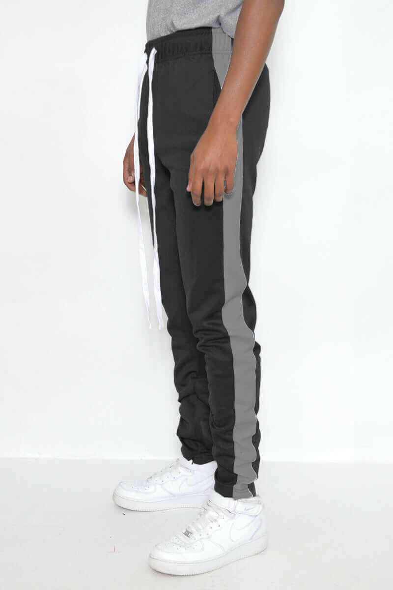 SLIM FIT TRACK PANTS.